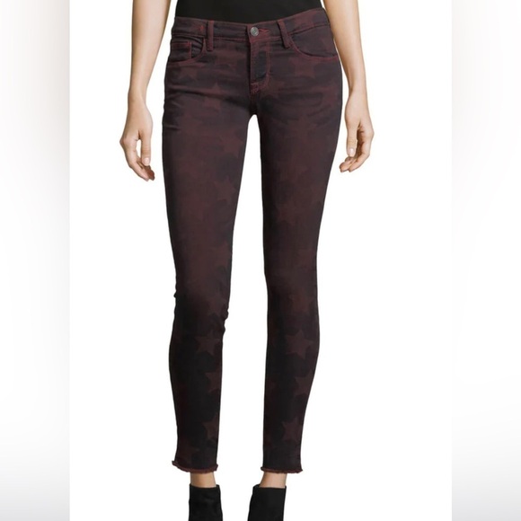 Denim - Etienne Marcel "Roos" jeans with star graphic print. Mid-rise; button-zip fly.